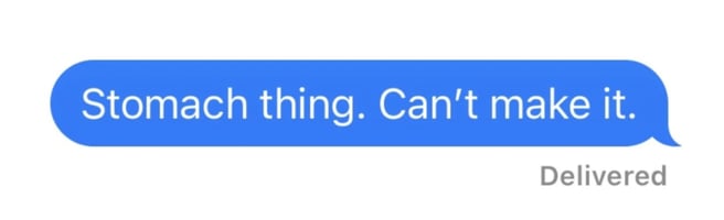 Blue iMessage bubble that reads “Stomach thing. Can’t make it.” representing a polite text message excuse for declining an invitation.